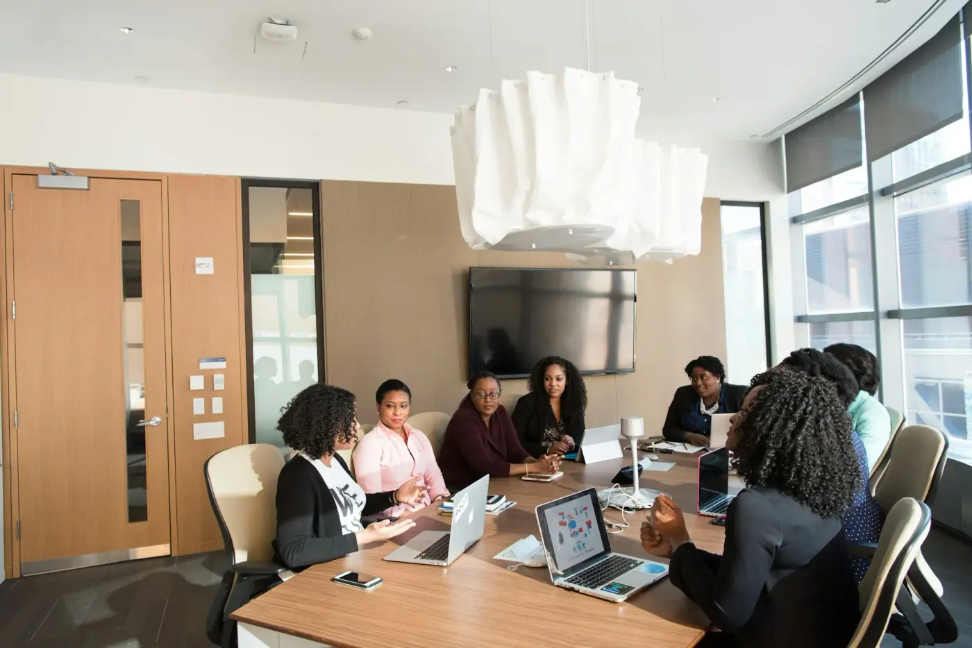 Executives reviewing an acquisition integration and operating plan