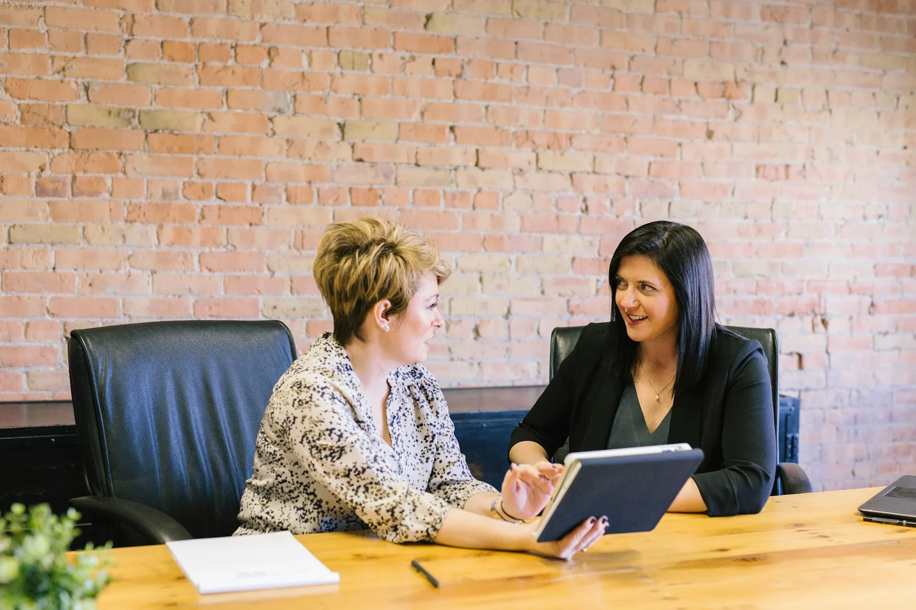 Business professionals participating in an applied learning session