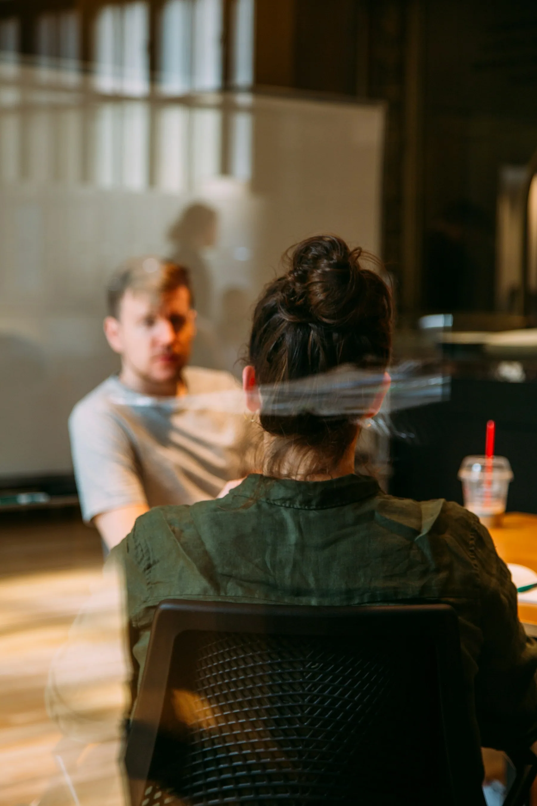 Two professionals in an interview conversation